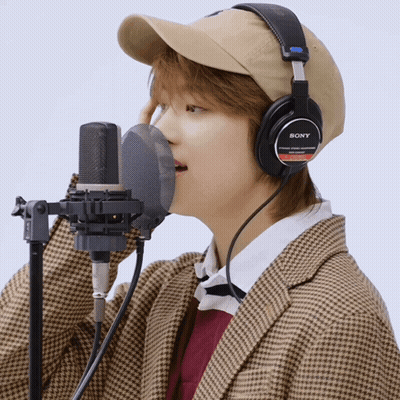 Person Wearing Sony Headphones GIF