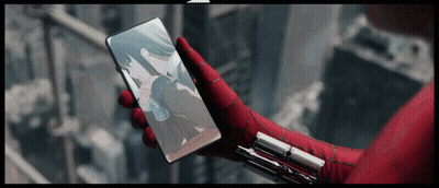 Person Wearing Spiderman Glove Holding Phone GIF