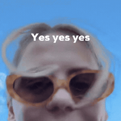 Person Wearing Sunglasses Saying Yes Yes Yes GIF