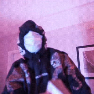 Person Wearing Supreme Mask And Jacket GIF