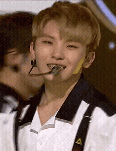 Person Wearing Suspenders And Microphone GIF