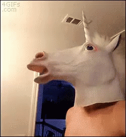 Person Wearing Unicorn Mask With Open Mouth GIF
