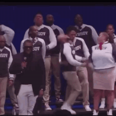 Person Wearing USOV Shirt On Stage GIF