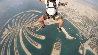 Person Wearing Vis Helmet Flying Through Air GIF