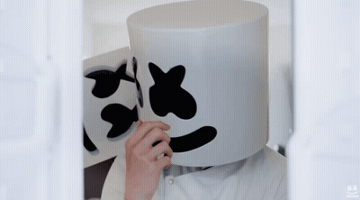 Person Wearing White Marshmallow Mask With Fish GIF