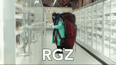 Person With Backpack Walking Through Grocery Store Rgz GIF