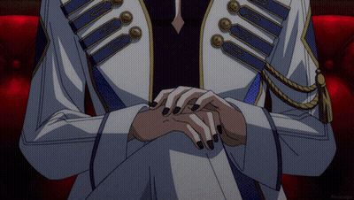 Person With Black Nails Sitting On Red Couch GIF