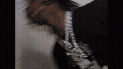 Person With Blue And White Pattern In Dark GIF