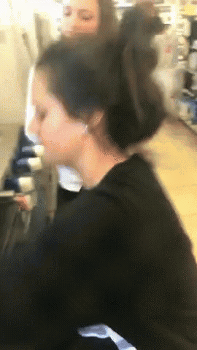 Person With Blue Backpack Climbing Rock Wall GIF