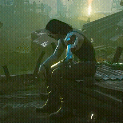 Person With Blue Hair Sitting In Video Game GIF