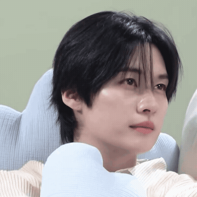 Person With Blue Pillow Around Neck GIF