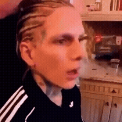 Person With Braids And Black Shirt GIF
