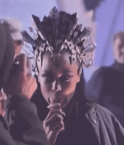 Person With Crown Drinking From Straw GIF