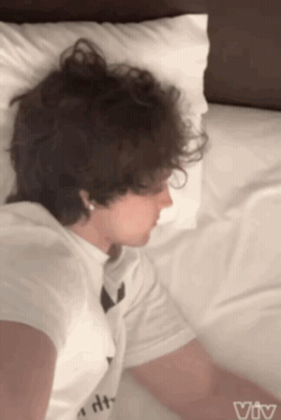 Person With Curly Hair Sleeping GIF