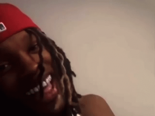 Person With Dreadlocks Red Hat Braces GIF