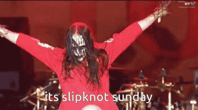 Person With Dreadlocks Singing Into Microphone GIF