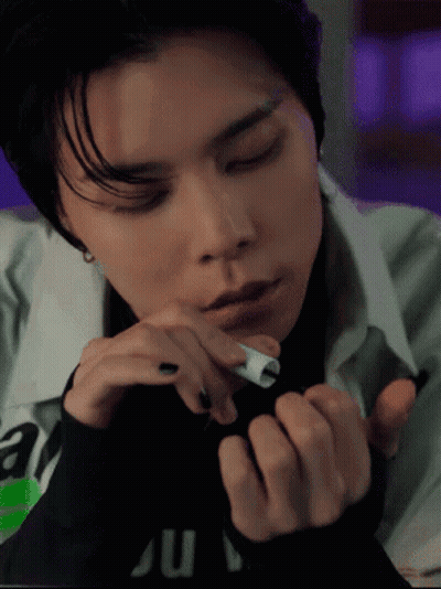Person With Eyes Closed And Ju On Shirt GIF