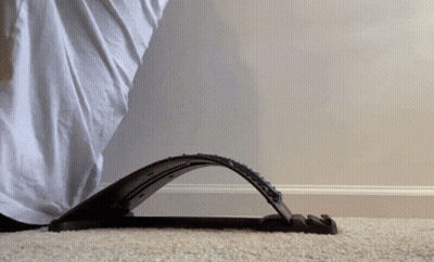 Person With Foot On Device On Carpet GIF