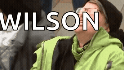 Person With Glasses In Green Jacket Wilson GIF