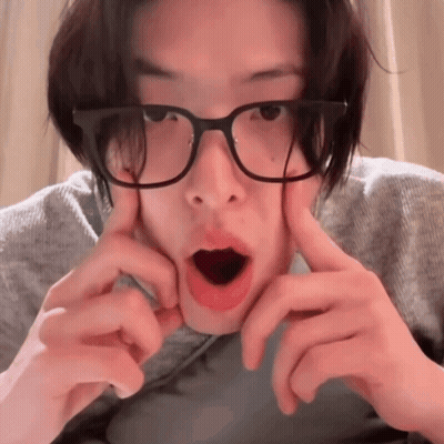 Person With Glasses Making Funny Face GIF