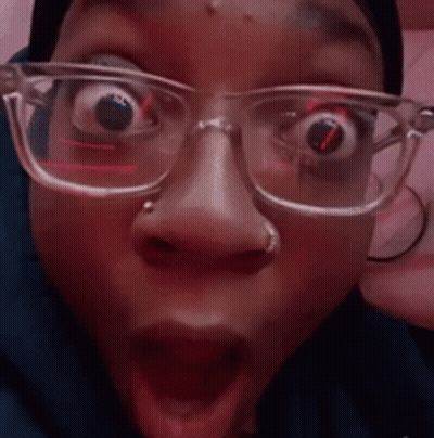 Person With Glasses Open-Mouthed Funny Face GIF