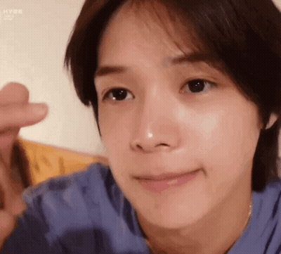 Person With Hand On Nose GIF
