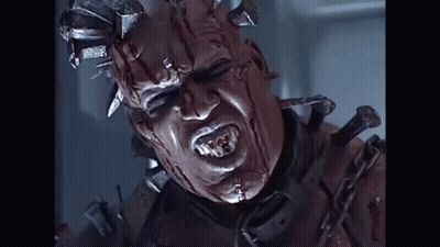 Person With Head Spikes And Chain GIF