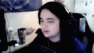Person With Headphones And Pacia Alphas Sign GIF