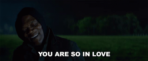 Person With Hearts Around Head GIF