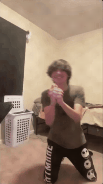 Person With Laundry Basket Wearing Ultimate Pants GIF