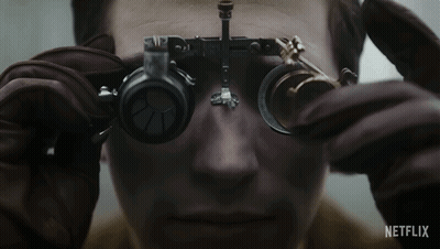 Person With Magnifying Glasses Netflix GIF