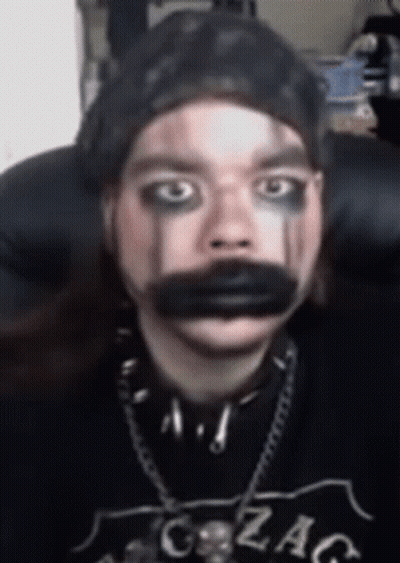 Person With Makeup And Gzag Shirt GIF