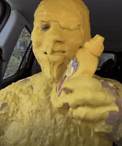Person With Mustard Bottle On Face GIF