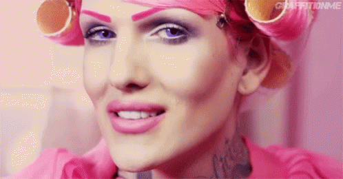 Person with Pink Hair and Curlers