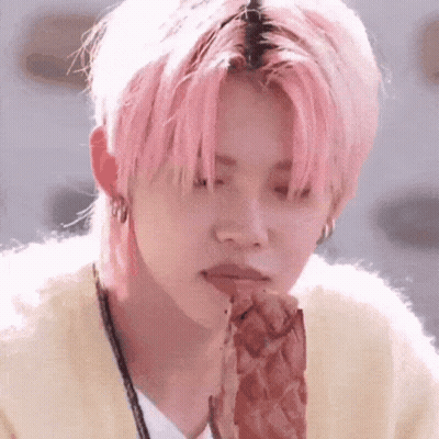 Person With Pink Hair Eating Meat GIF