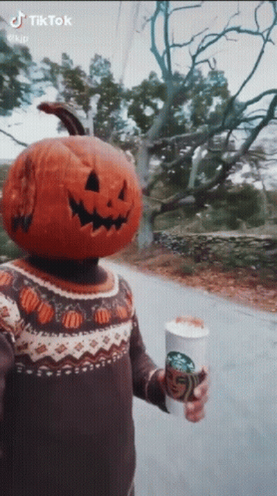 Person With Pumpkin Head Holding Starbucks Coffee GIF