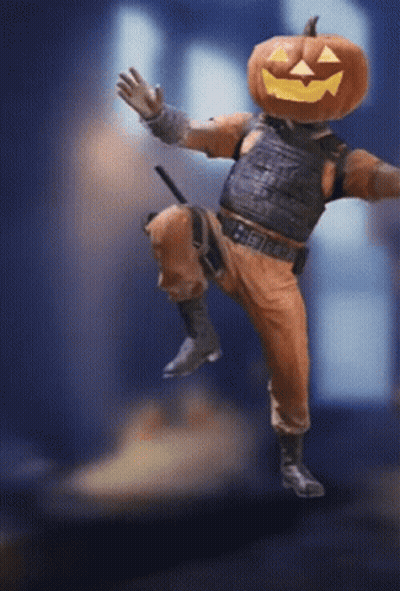 Person With Pumpkin On Head Standing On One Leg GIF