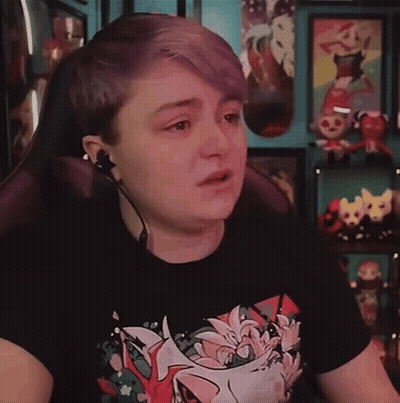 Person With Purple Hair in Floral Black Shirt