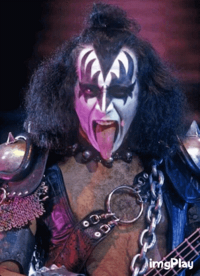 Person With Purple Paint On Face Tongue Out GIF