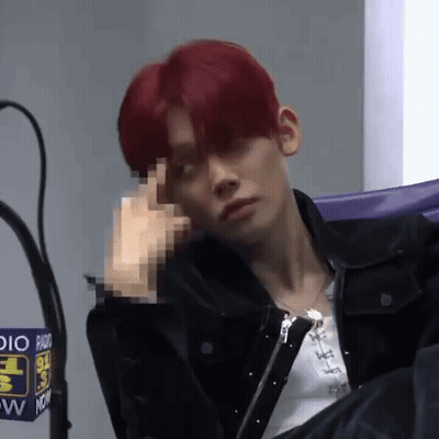 Person With Red Hair And Blue Jacket GIF