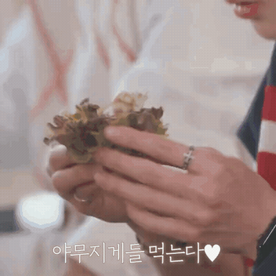 Person With Ring Holding Salad GIF
