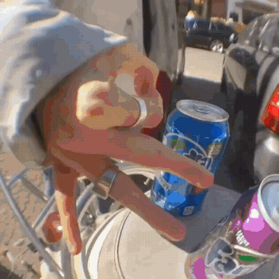 Person With Ring Holding Sprite Can GIF