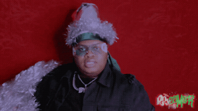 Person With Santa Hat And Tinsel Thumbs Up GIF