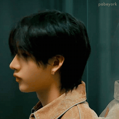Person With Short Hair In Denim Jacket GIF