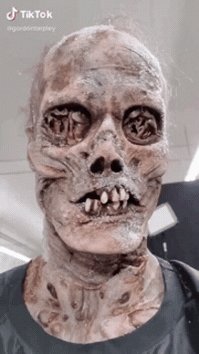 Person With Skeleton Mask GIF
