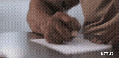 Person Writing On Paper With Pen GIF