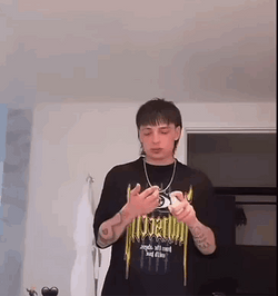 Peso Pluma Dancing While Applying Cream GIF