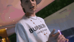 Peso Pluma Putting Finger On Lips GIF