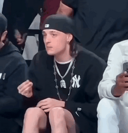 Peso Pluma Sitting Courtside GIF