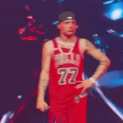 Peso Pluma Wearing Bulls Jersey GIF